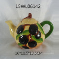 Handpainting ceramic teapots in pineapple pattern